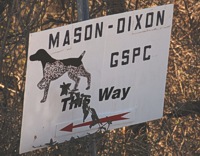 The Mason-Dixon club's road sign shows the way to the event grounds at Maryland's McKee-Beshers preserve.