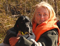 Pointer and her mom watch the senior bird field from the sidelines.
