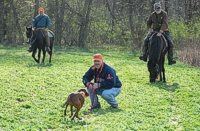 The judges have called time, and the handlers call their dogs back in for some praise after a tense 30 minutes.