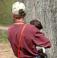 New experiences are great, but so is the nice comforting view from in dad's arms.