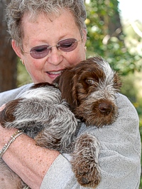 Mama mia! Bobbi Benson and one of her adoring pups.