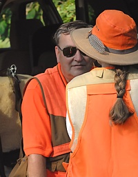 Wayne (gunner) and Mary (bird planter) discuss the conditions as they wait for the first Master brace to head out. All of that blaze orange is essential near the bird field - real shotguns will be throwing real shot, and everyone needs to be seen.