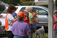 Some festivities as the placements for the Open Puppy stake are announced.