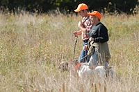 Once the judges have called time to end the brace's run, it's good form to leash the dogs on the way out of the field. There are usually still birds down that can be used by the next brace.