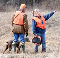 Dennis pays attention to some pointers from Kristen, but that Weim only has eyes for those two quail, inches away in her bird bag.