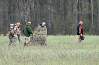 Moving the blind. Each new track needs to start upwind, and far enough away from the previous track to give each dog something specific with which to work.